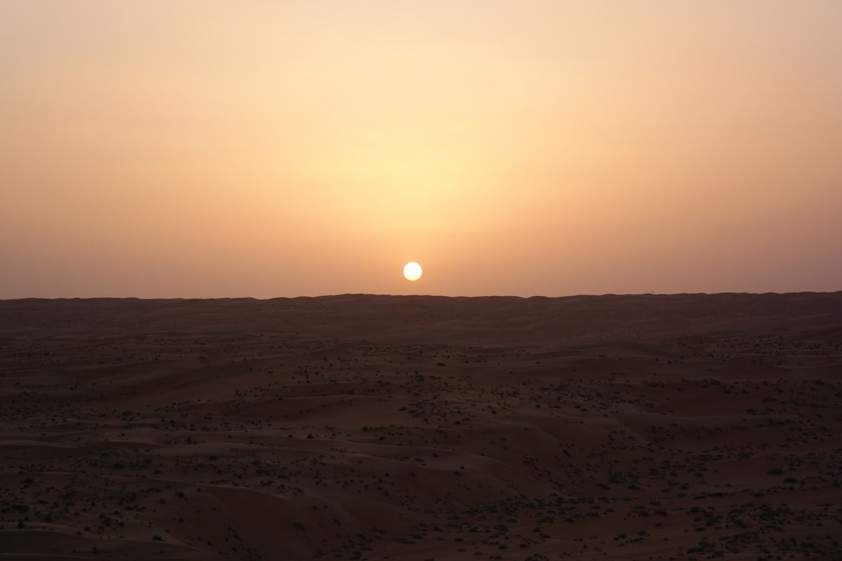 Zonsondergang woestijn Oman