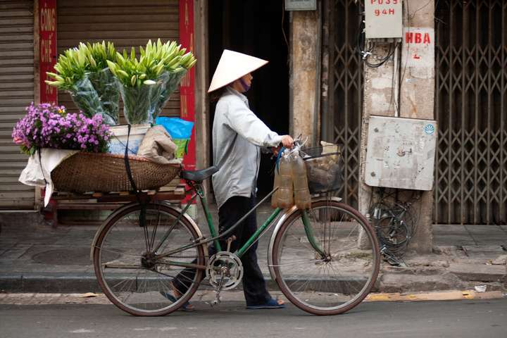 Bloemenverkoper op de fiets