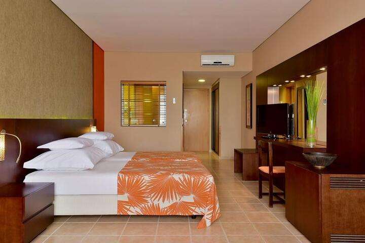 Slaapkamer van 'Executive Sea View'