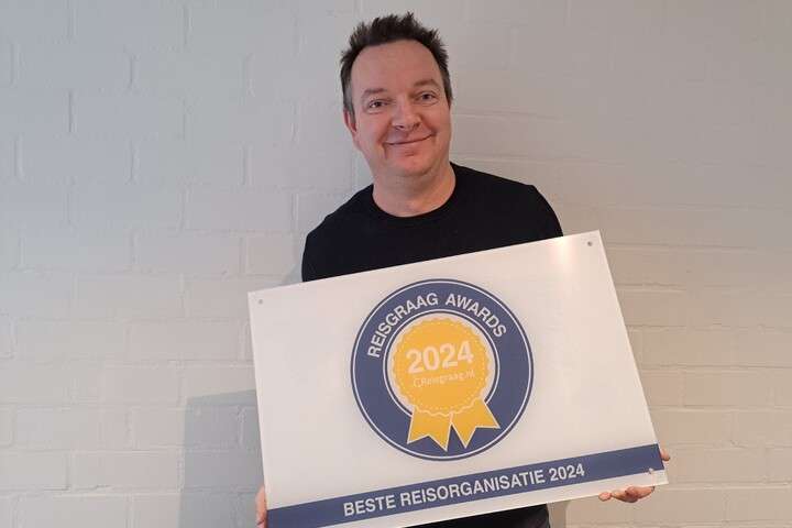 Andros met de award