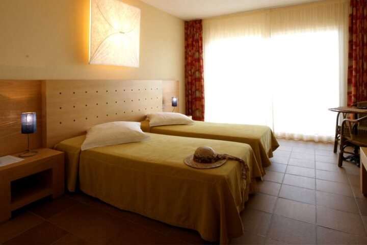 Bedden van 'Tweepersoonskamer Zeezicht'