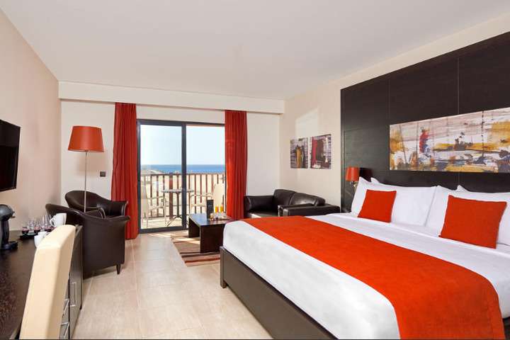 Slaapkamer van 'Tweepersoonskamer Zeezicht'