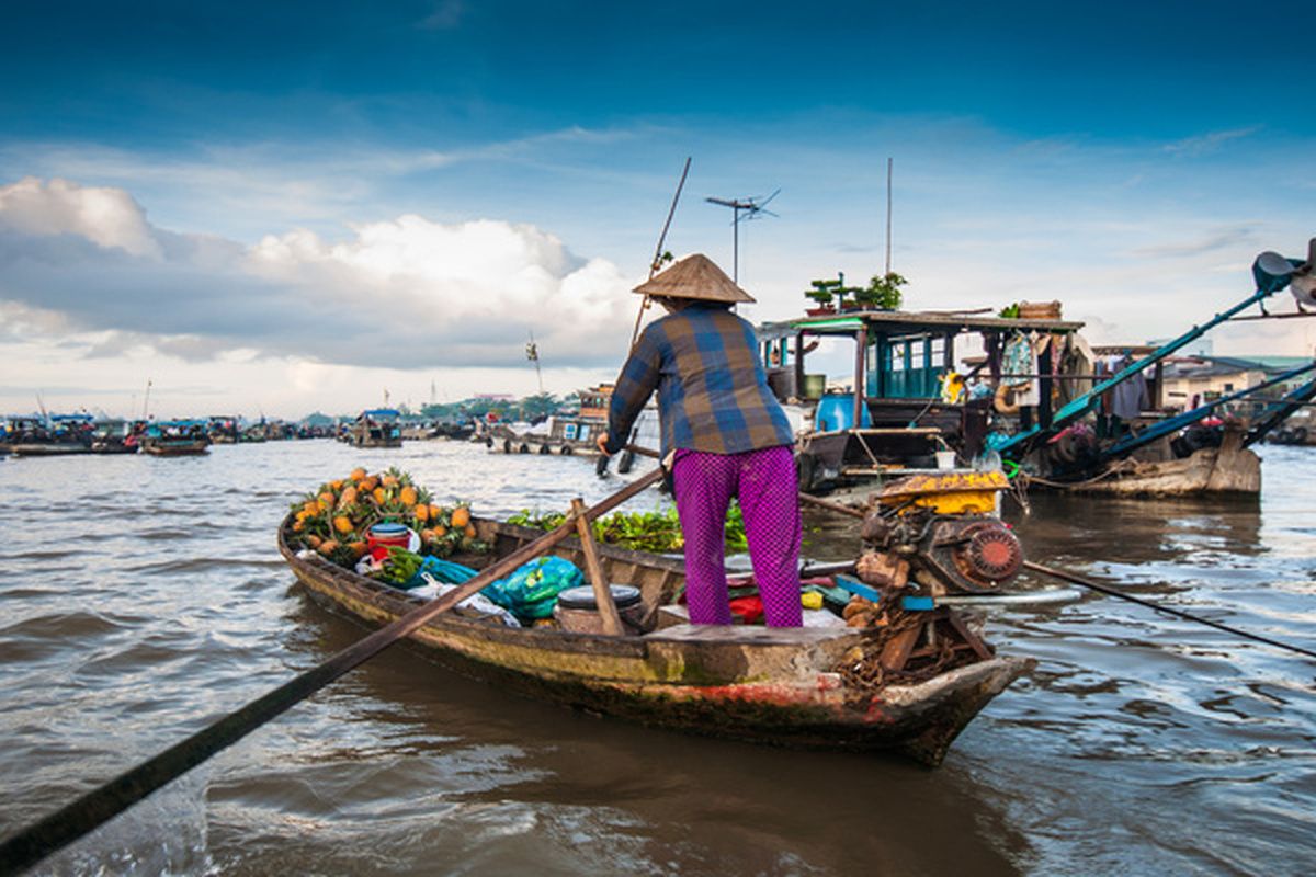 Een drijvende markt in de Mekong Delta