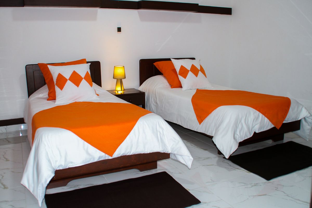 Voorbeeld van de slaapkamer met aparte bedden