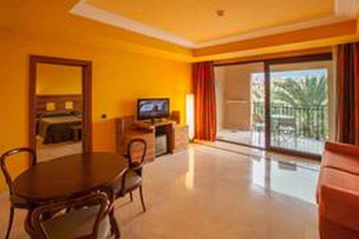 de woonkamer van '2-persoonskamer, Junior Suite'