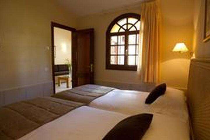 de slaapkamer van '3-kamer villa'