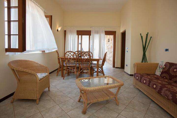 Zitgedeelte van 'Tweepersoonskamer Bungalow Zeezicht'